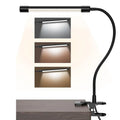 Black or white USB-powered LED desk lamp on a desk, showing its 26 cm compact length.