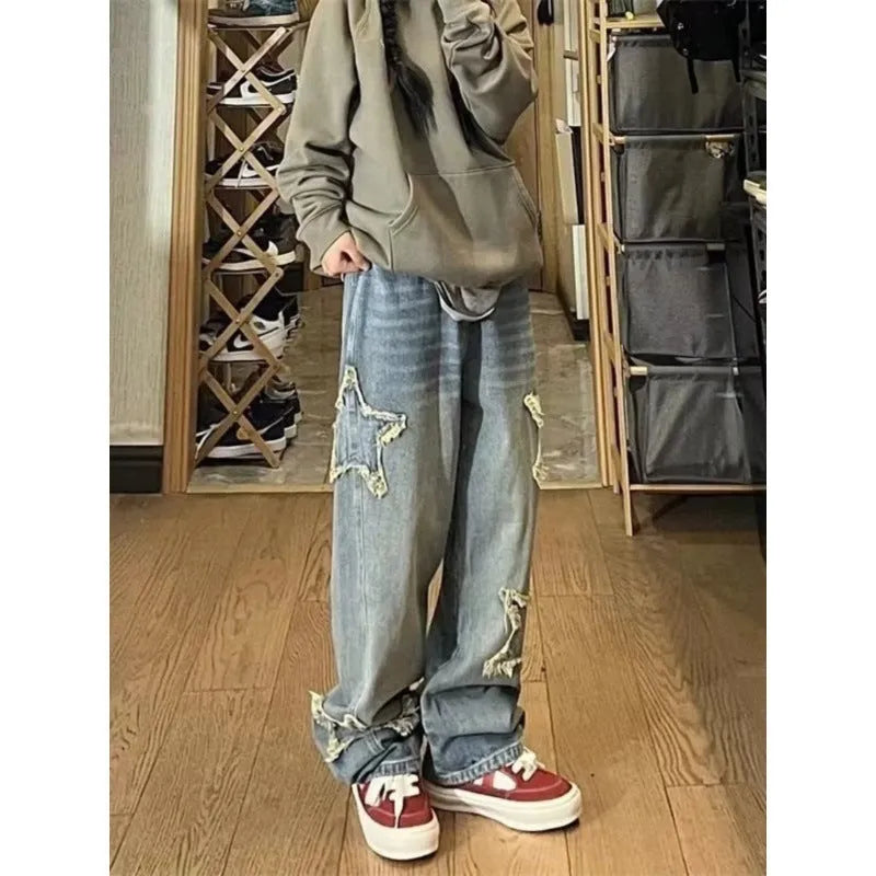 Blue high-waist wide-leg denim jeans with straight cut on hanger