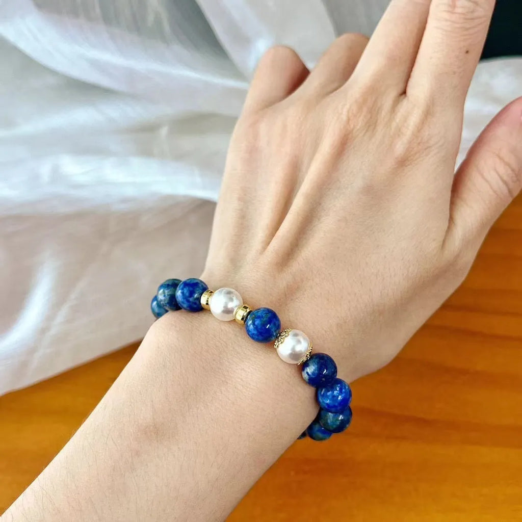 Lapis lazuli green gold stone bracelet with Chinese retro artistic design on wrist