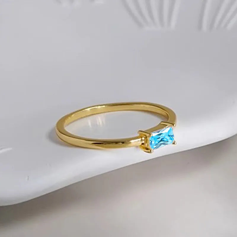 Sapphire blue zircon geometric bracelet ring for women with copper base and oval and heart shaped stones