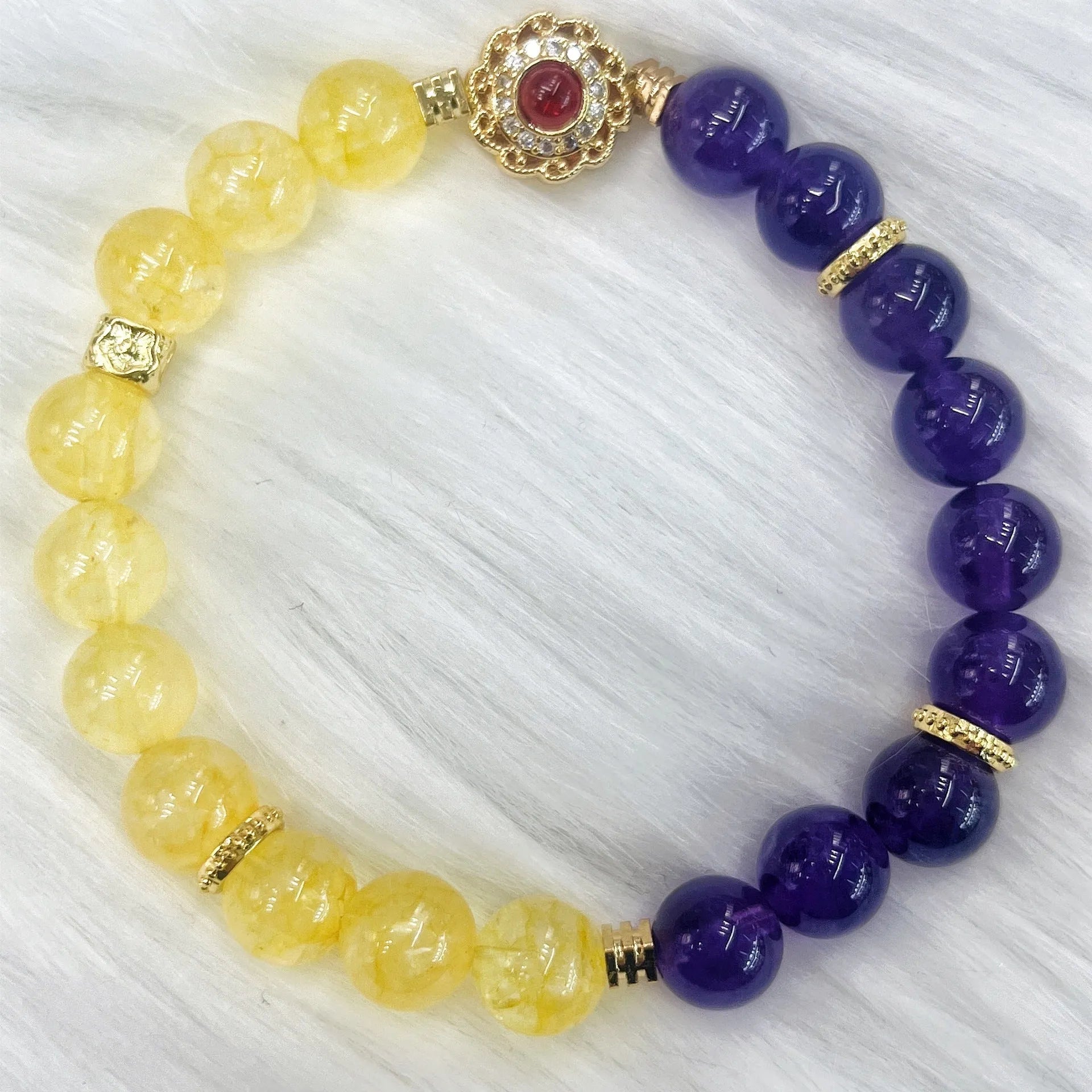 Handmade women's crystal bracelet with amethyst stones in yellow and purple colours