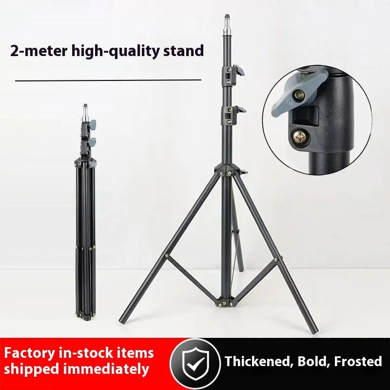 Mobile phone tripod light stand with frosted finish and phone holder attached