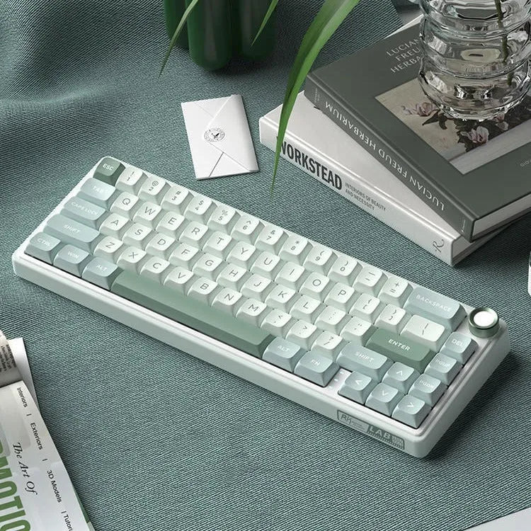 Wireless mechanical keyboard with RGB backlighting in multiple colour options showing Bluetooth connectivity