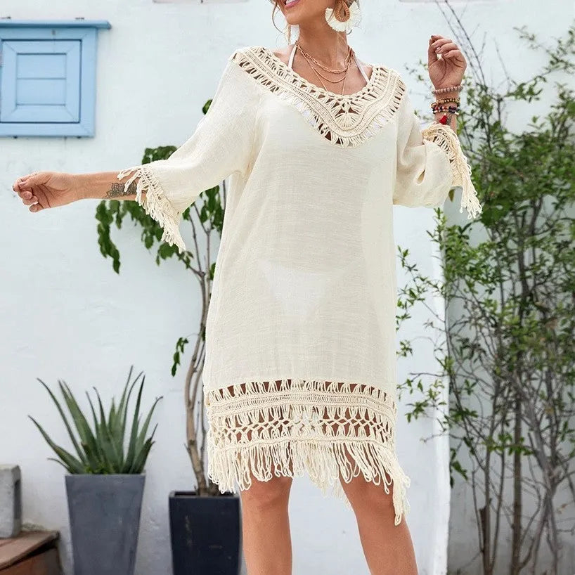Apricot crocheted patchwork knitted dress with half sleeves on a person.
