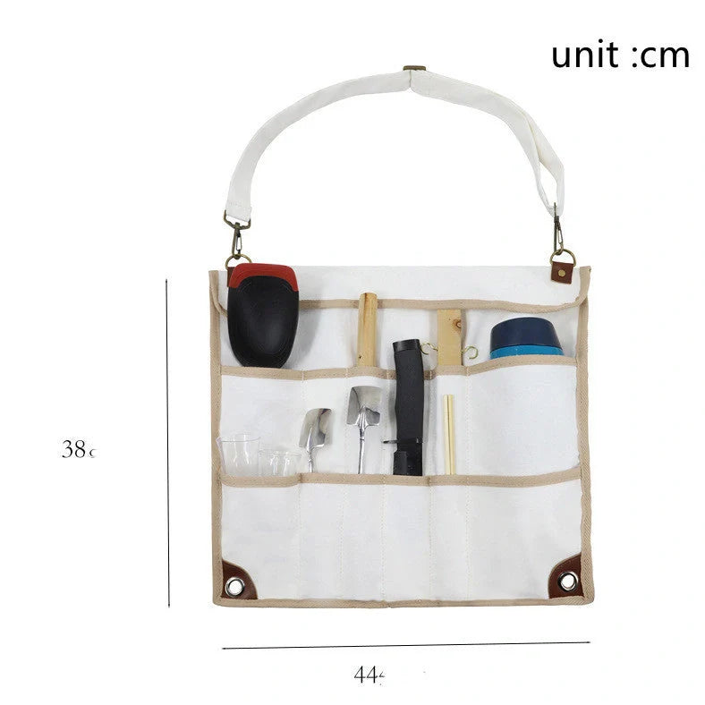 Camping tableware storage bag with 44x38cm dimensions and hanging feature for outdoor utensil organisation