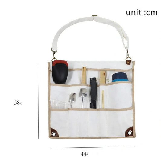 Camping tableware storage bag with 44x38cm dimensions and hanging feature for outdoor utensil organisation
