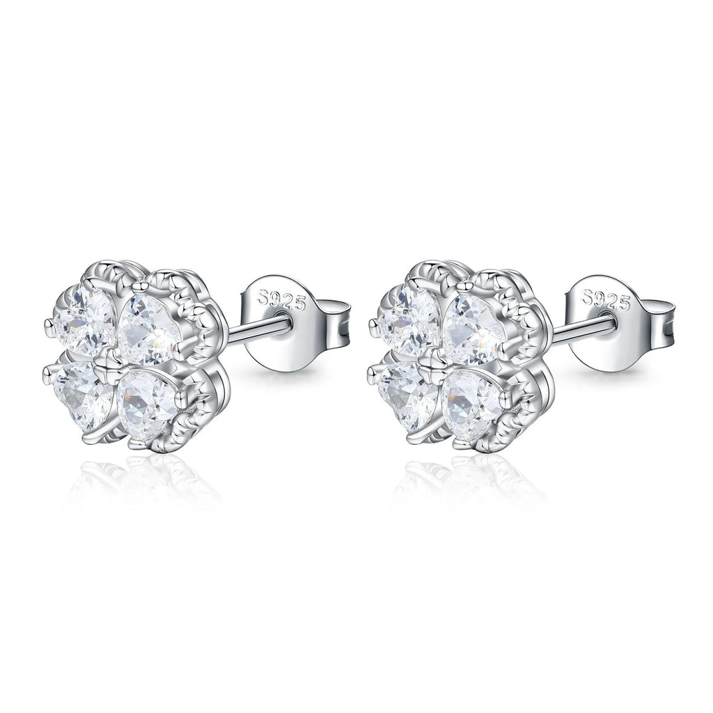 Women's sterling silver heart-shaped earrings with a four-leaf clover design and zircon stones.