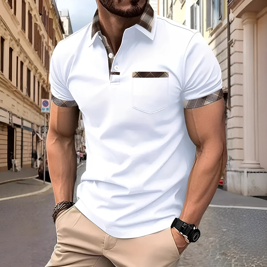 Man wearing a loose fit short sleeve t-shirt with a red and black plaid colourblock design.