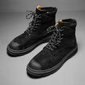 Men's frosted brown Martin boot with round toe and thick rubber sole on a grey background.