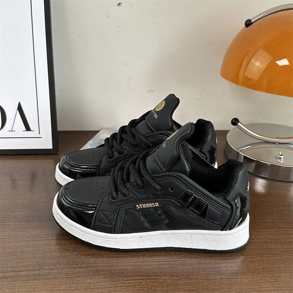 Men's black thick bottom board shoes with PU leather upper and rubber sole on a light background