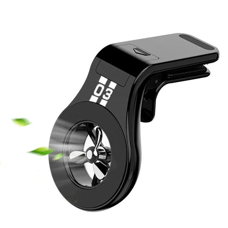 Magnetic car phone holder mounted on air vent with smartphone attached and fragrance slices