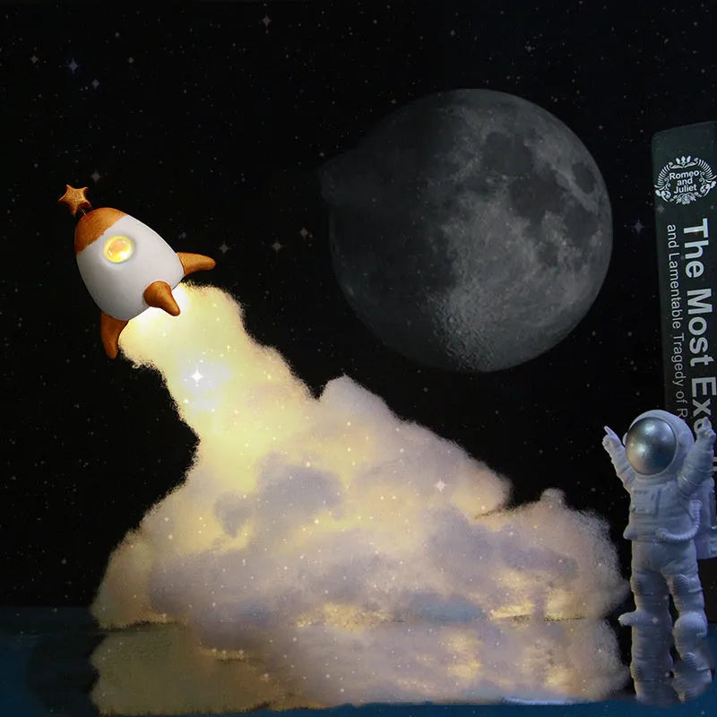 DIY astronaut rocket night light kit with warm LED lighting and assembly materials