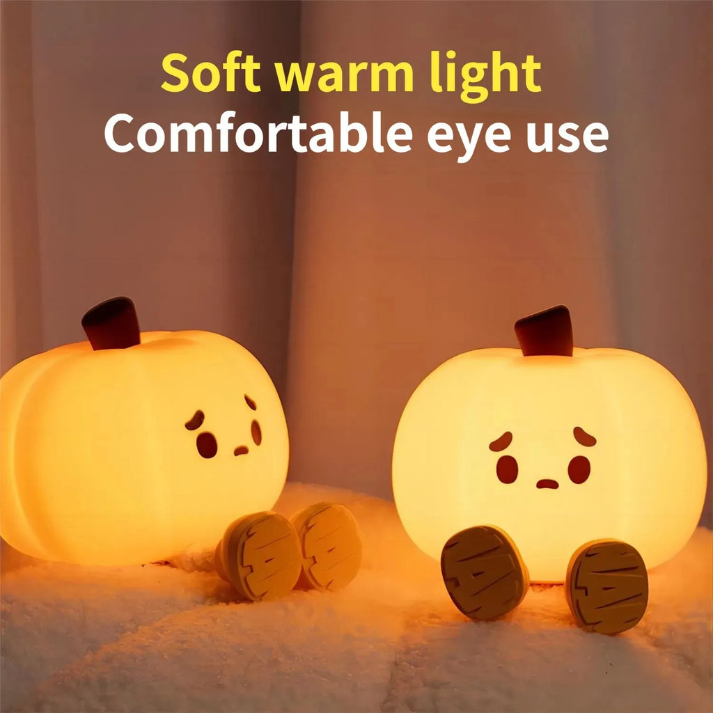 Soft silicone pumpkin night light with touch controls and warm LED glow