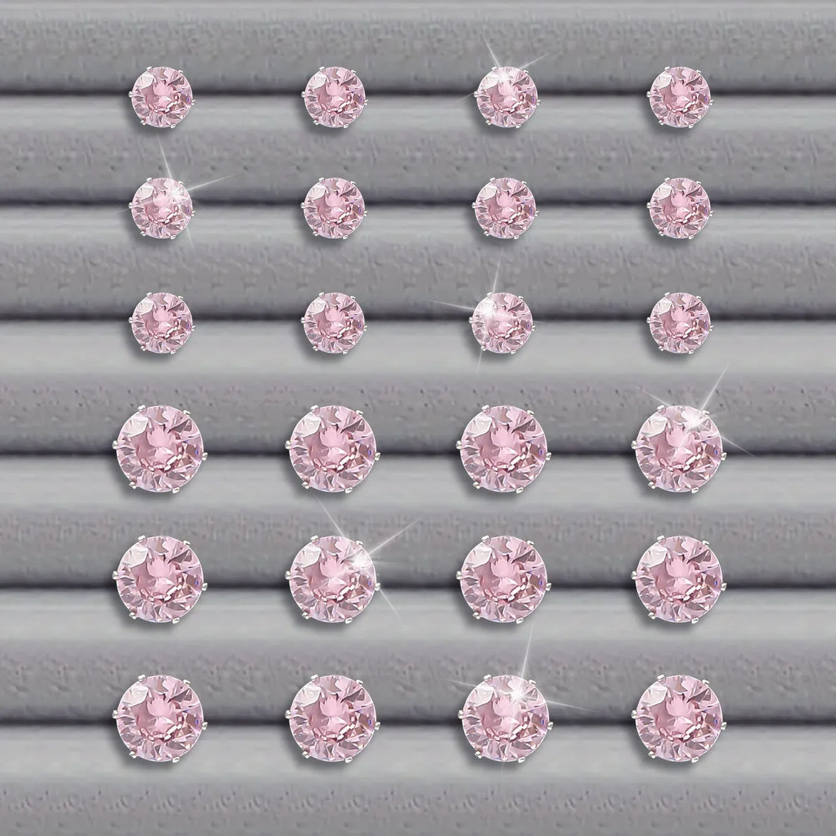 Pink round women's earrings set with 12 pairs of alloy electroplated geometric studs on display