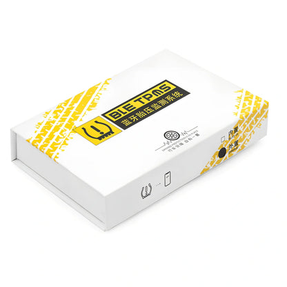 Bluetooth external tyre pressure monitor JVC11-B attached to car valve, showing smartphone app alert for 2.3 bar reading