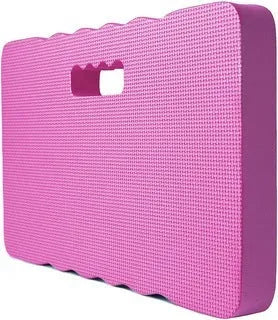 Blue EVA foam garden kneeler mat on grass, showing its rectangular shape and thickness.