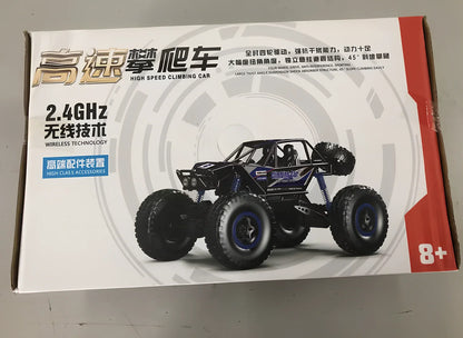 Blue 4WD remote control car with off-road tyres and 2.4GHz controller