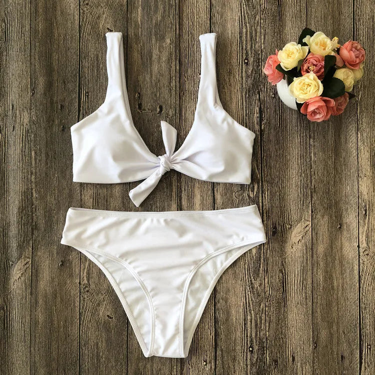 Women's polyester bikini set in black, pink, red, white or wine red with matching bra and panties