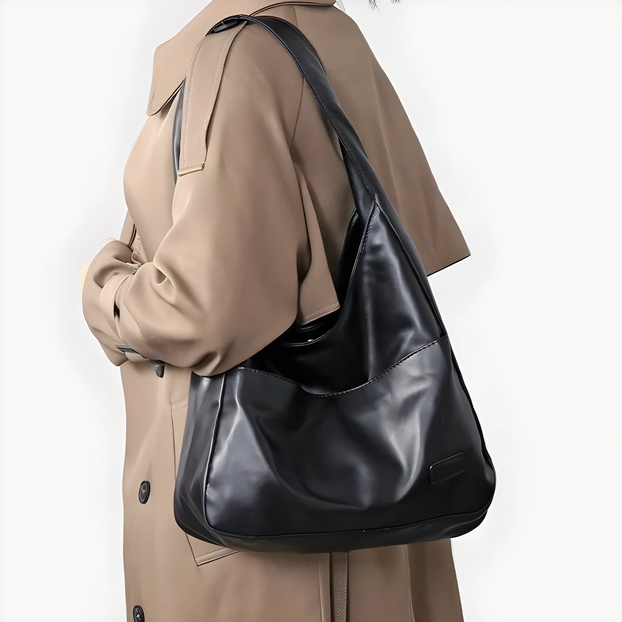 Women's soft PU leather retro shoulder bag in black with single strap and open pocket.