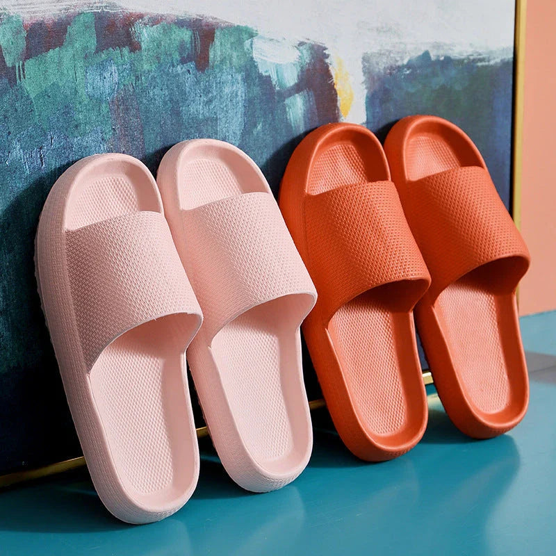 Stylish and comfortable EVA bathroom slippers with soft cushioned soles and anti-slip design, available in a variety of vibrant colors.