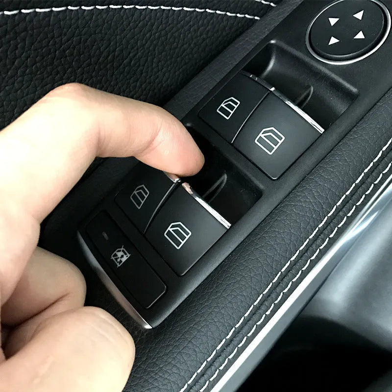 Black glitter decorative sticker for a car window switch button on a white background.