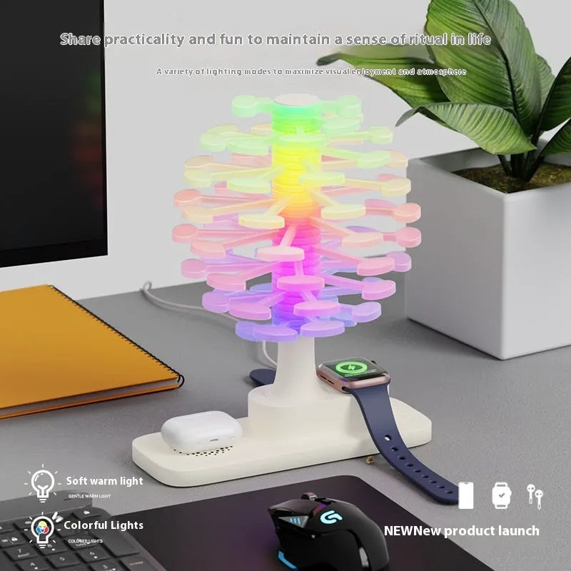 Spiral Tree geometric modern LED desk lamp with white light on a wooden surface.