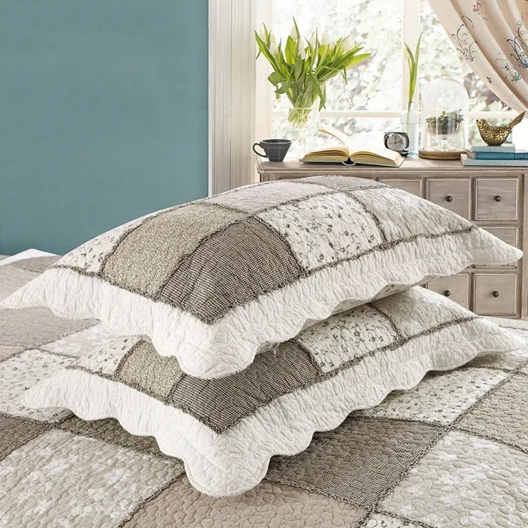 Korean style pure cotton quilted bedspread and two pillowcases in a three-piece bedding set.
