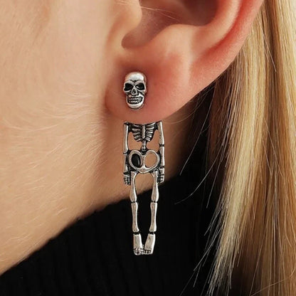 Halloween skull stud earrings in gold and silver with detachable design