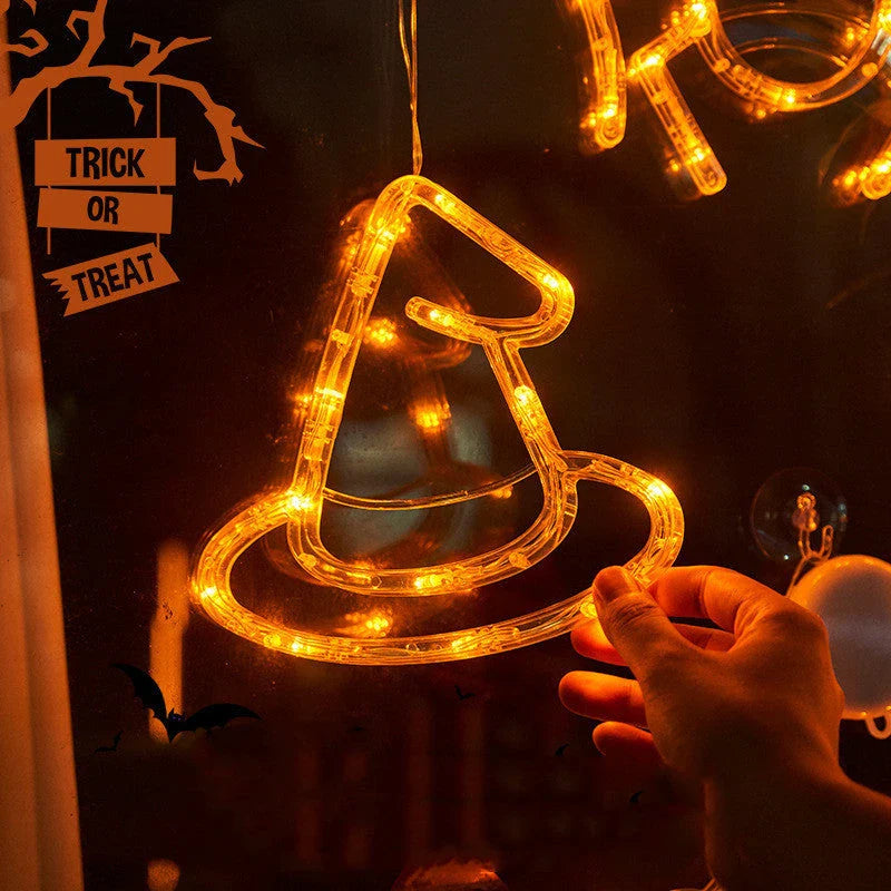 Spooky Halloween window hanging lights featuring pumpkins, spiders, and ghostly figures for a festive atmosphere