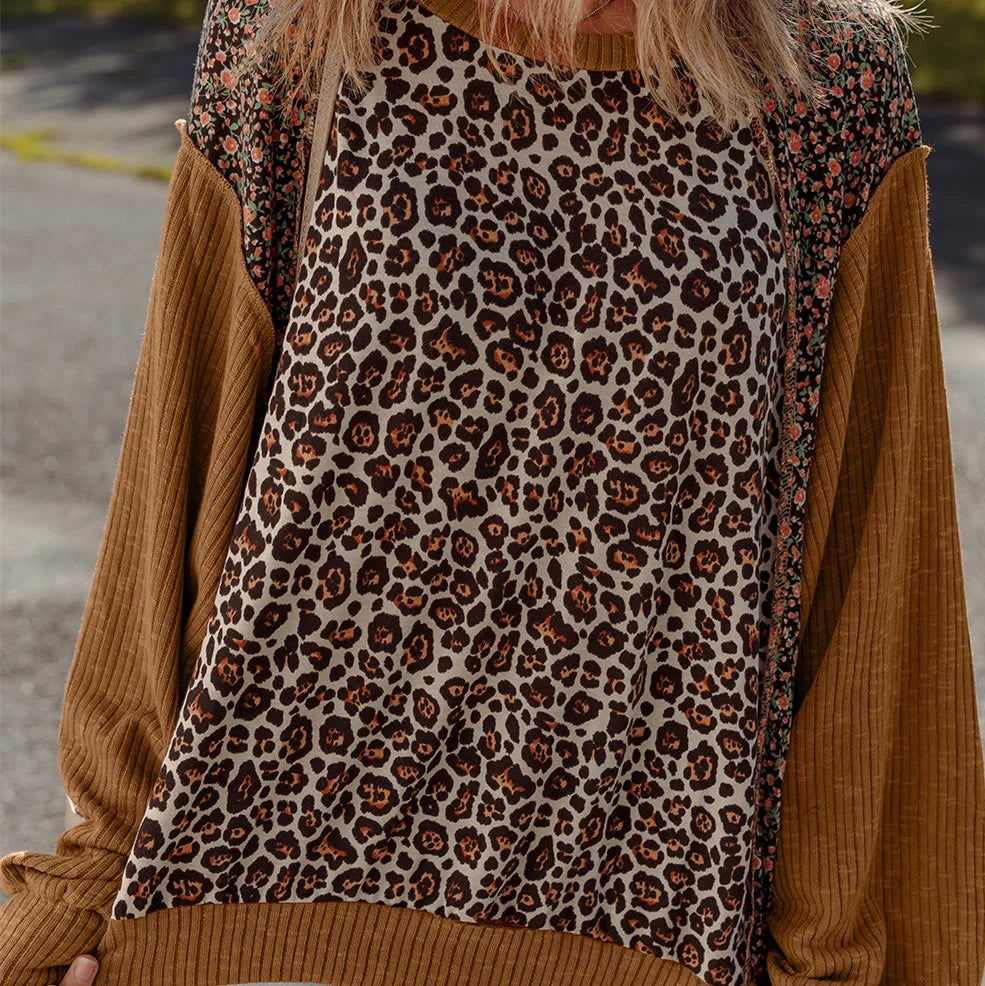 Women's brown leopard print loose fit sweater with long sleeves and hollow knit construction