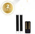 Set of four tall black LED taper candles with realistic flickering 3D flame tips.