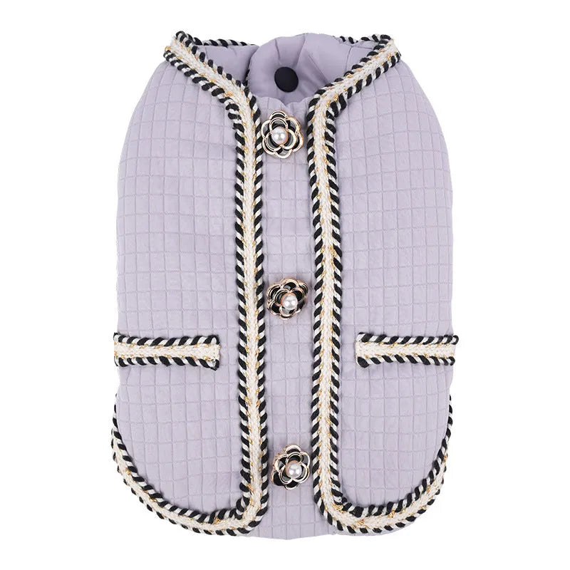Quilted polyester dog coat with cartoon pattern in light purple colour on medium-sized dog