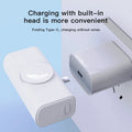 Compact 5000mAh portable power bank with folding double head in black plastic shell