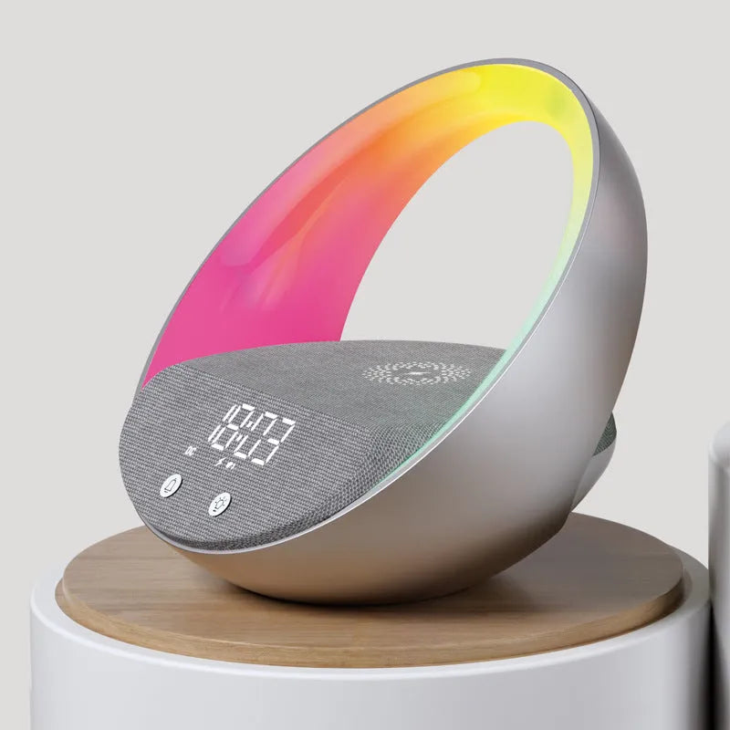 Beige or grey multifunctional desk unit with wireless charging pad, speaker grille, digital clock display, and LED light panel
