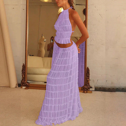 Stylish women's backless halter top and pleated maxi dress set in a variety of vibrant colors