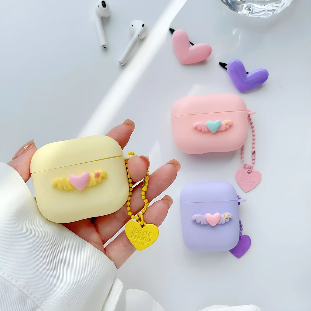 Heart Wings TPU protective case for AirPods with three-dimensional relief design in pink, purple, and yellow colours