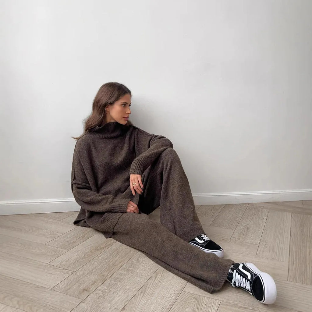 Women's dark grey acrylic knit suit set with side-slit sweater and trousers