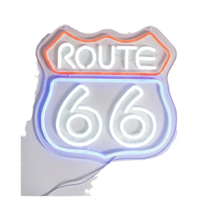 66 Highway LED neon word sign emitting warm white glow against a dark background