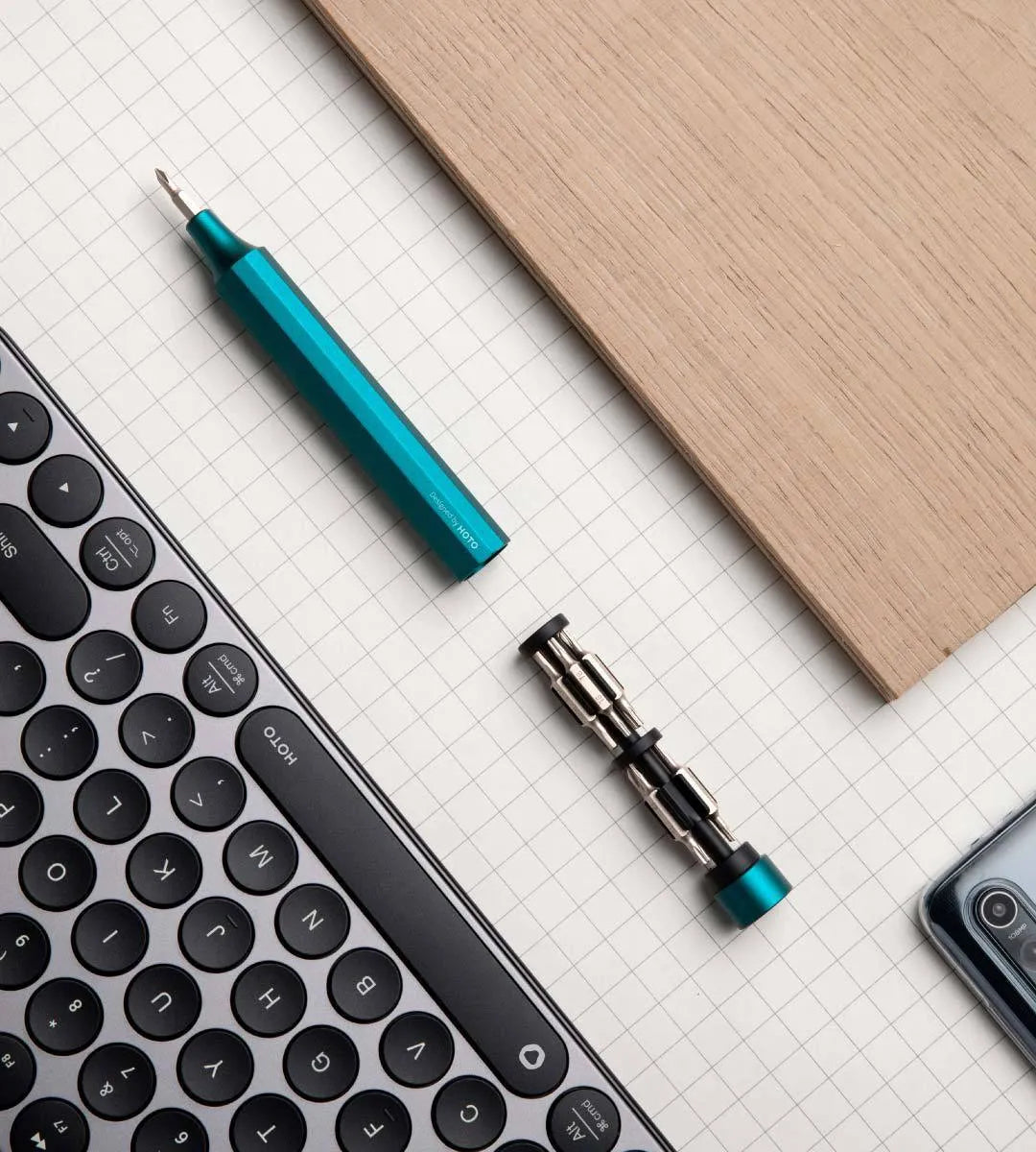 Black oxide 24-in-1 precision repair screwdriver set with magnetic bits stored in handle for phone and computer disassembly