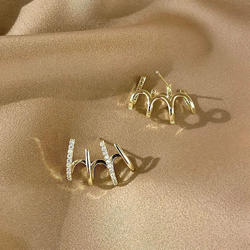 S925 silver needle four-prong zircon inlaid ear studs in gold finish, geometric shape, for women