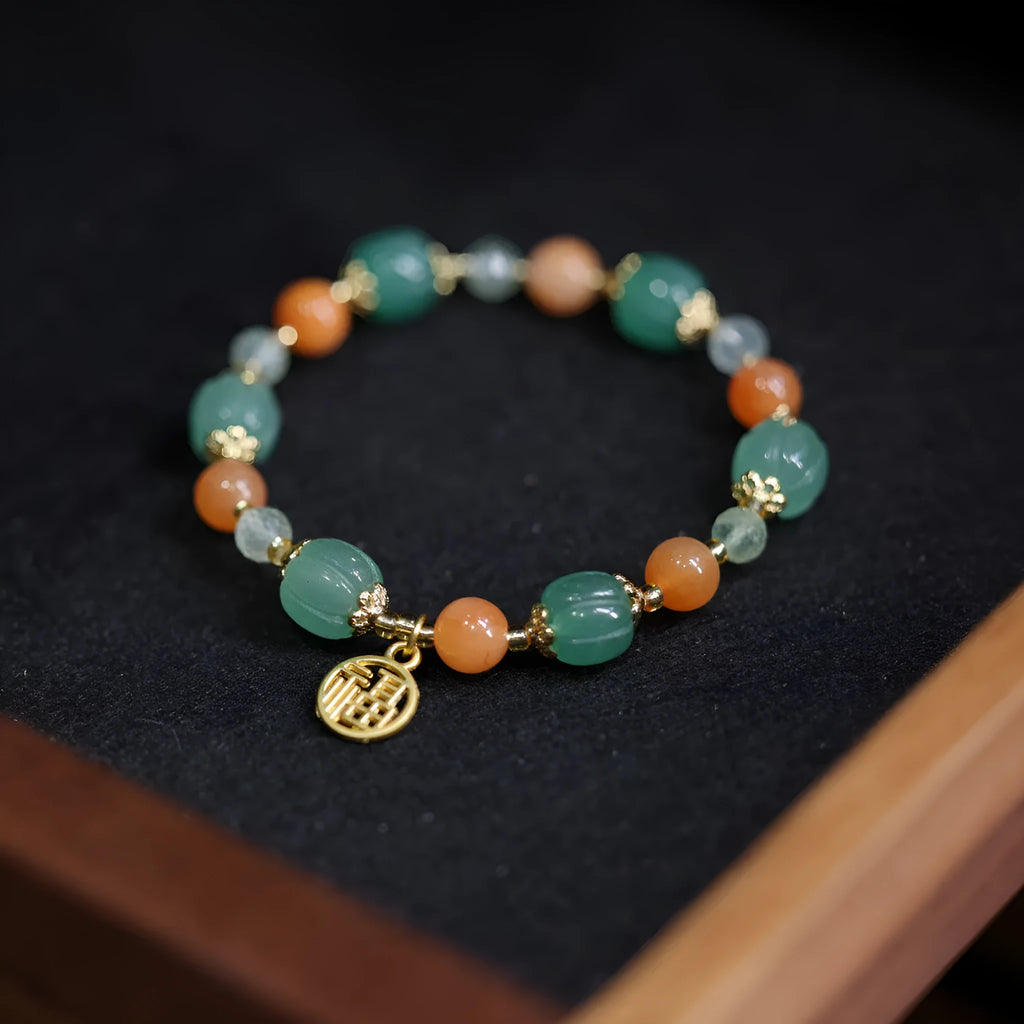 Chinese style Duobao pumpkin bracelet made from Jinsi Jade barrel beads with Prehnite stone, sized for 14-16.5cm wrists.