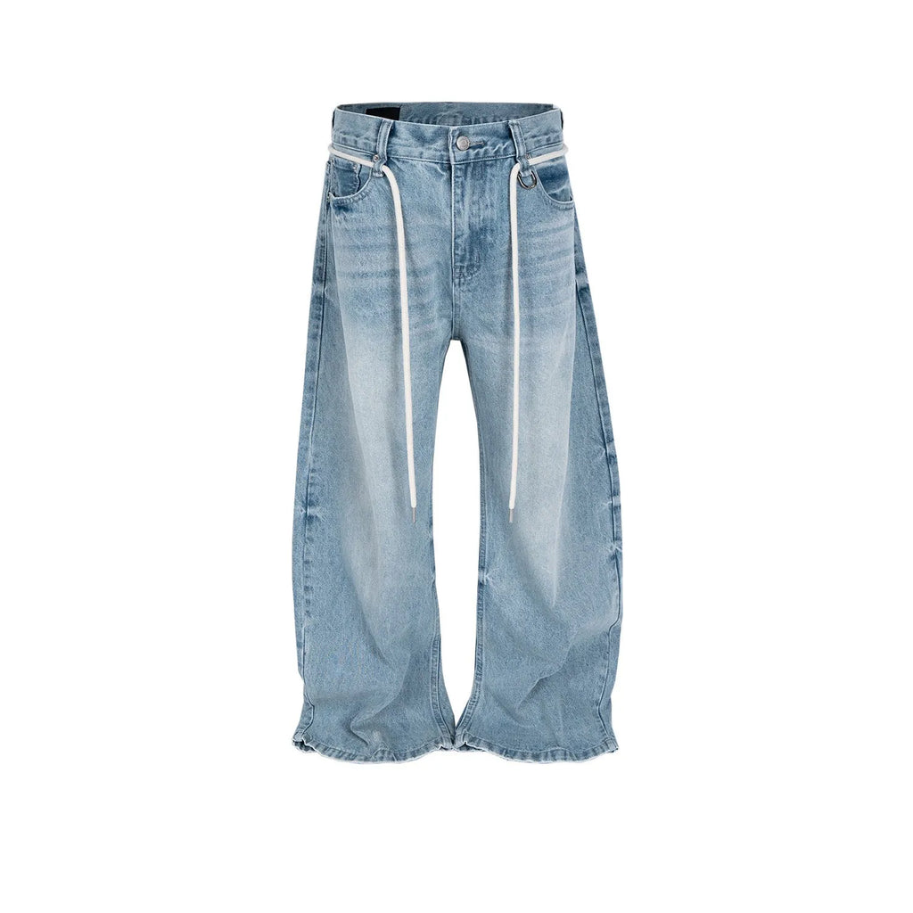 Blue vintage washed denim straight-leg trousers with drawstring belt and zipper fly closure