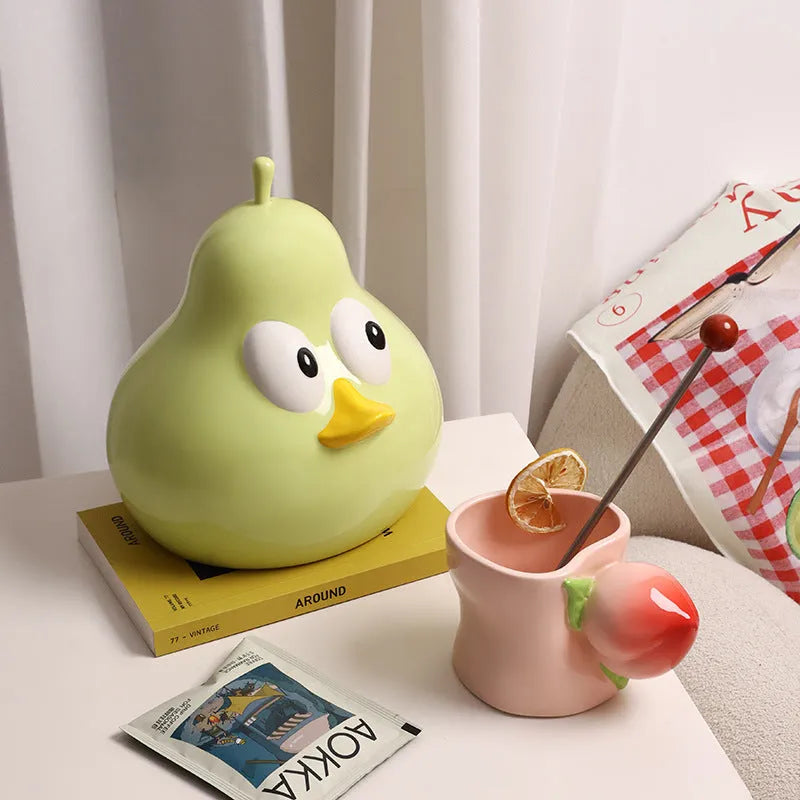 White ceramic tissue box with pear shape in green colour option