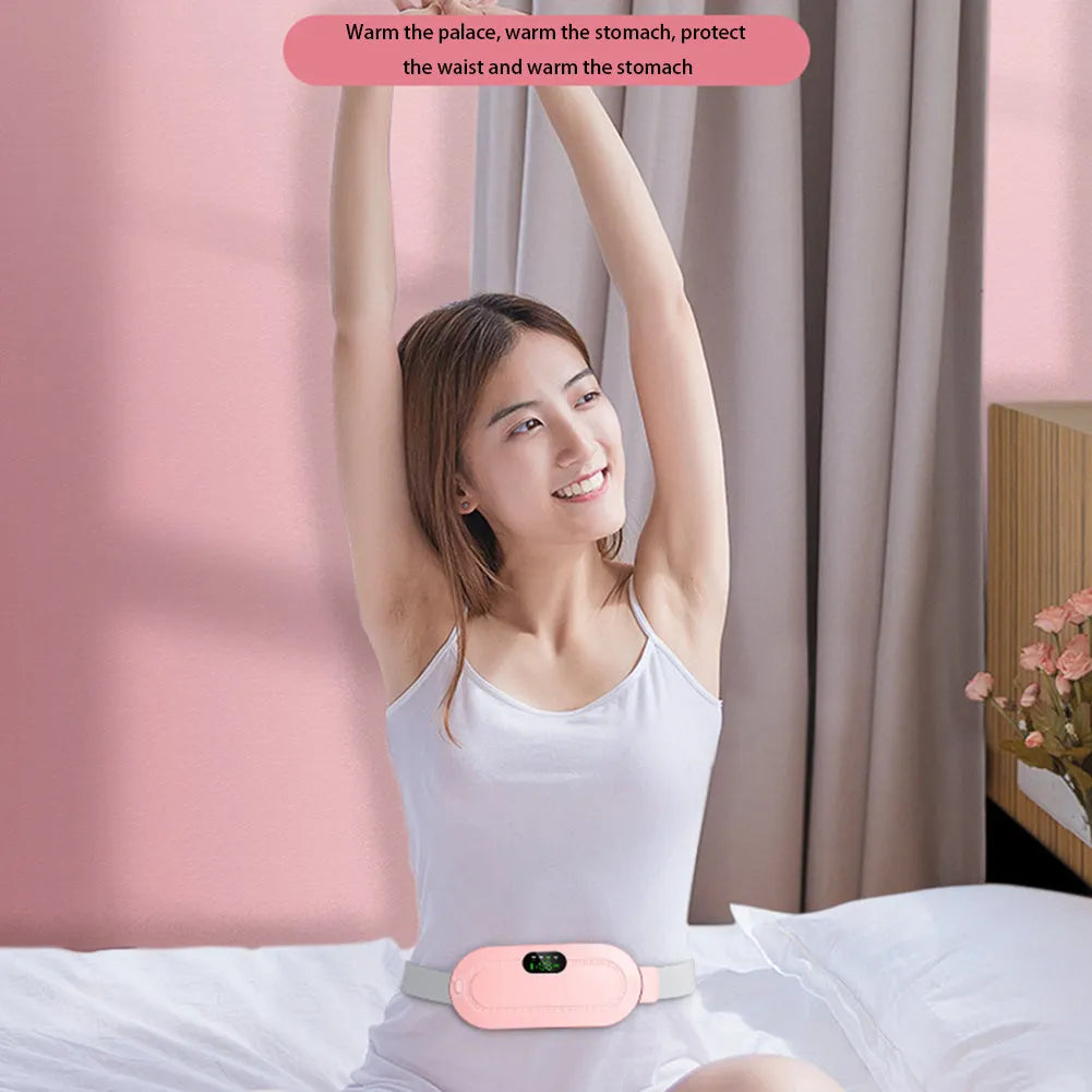 Pink electric heating and massage belt for waist and abdominal pain relief with digital controller.