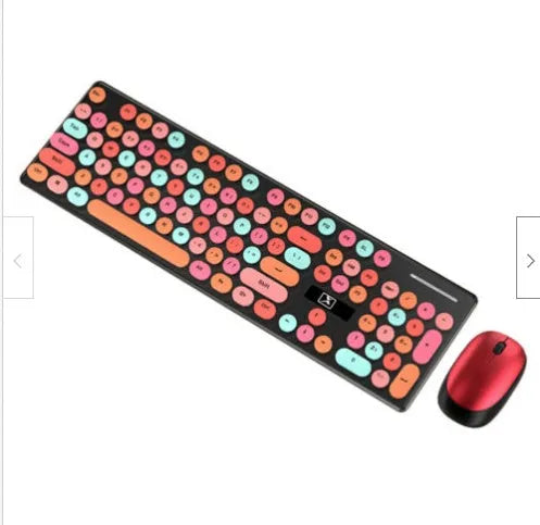 Vibrant yellow wireless punk manipulator keyboard and mouse set on a desk.
