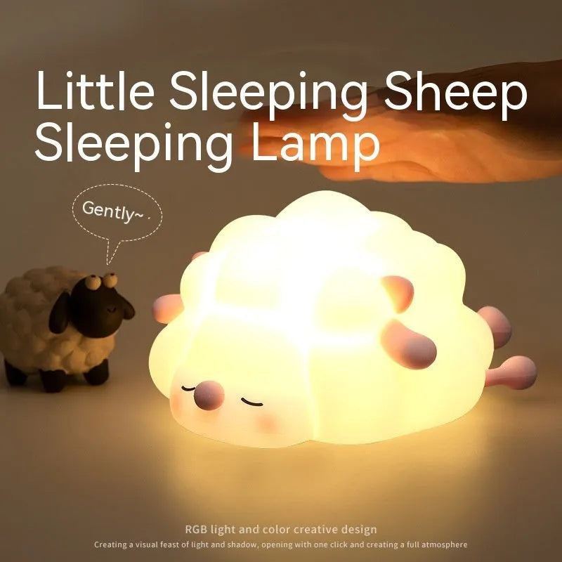 Cute silicone night light sheep cartoon bedroom lamp with warm light, rechargeable, on a bedside table