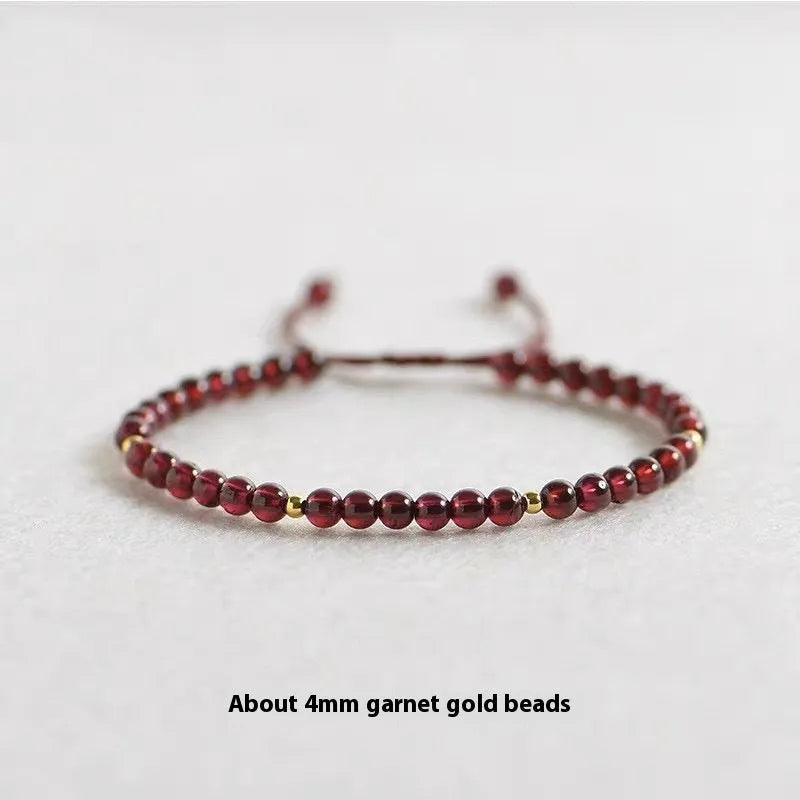 Hand-woven Chinese garnet bracelet with red rope and flexible wire