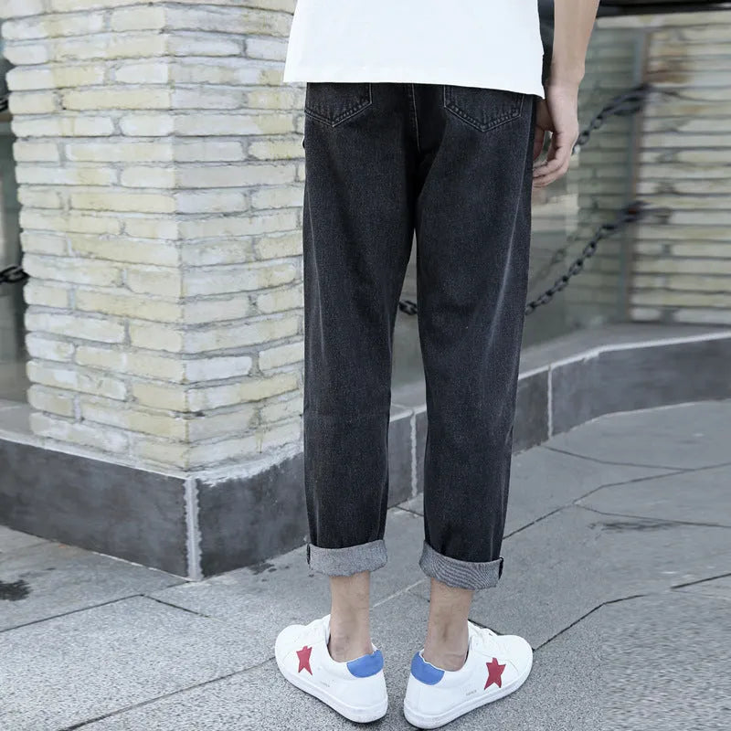 Men's loose straight leg jeans in black and blue colours with cotton fabric and casual college style.