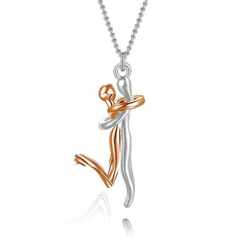 A beautiful 18K gold-plated necklace with a charming doll-like pendant and a cross-chain design, perfect as an anniversary or Valentine's Day gift for couples.