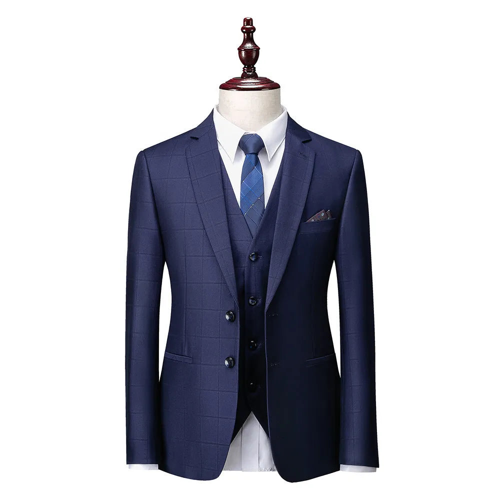 Men's navy blue plaid slim fit three-piece suit featuring a vest, jacket, and trousers on a hanger.